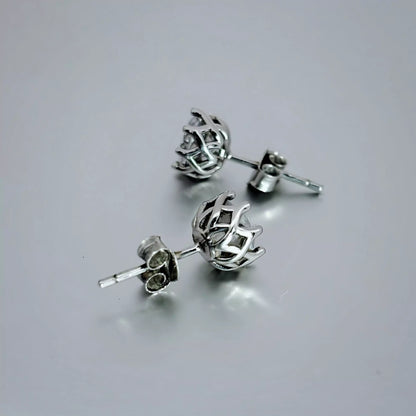 Silver Stud Cubic Zirconia Earrings round clear stone, Basket  earring design. , Sterling Silver 925, on a grey background.